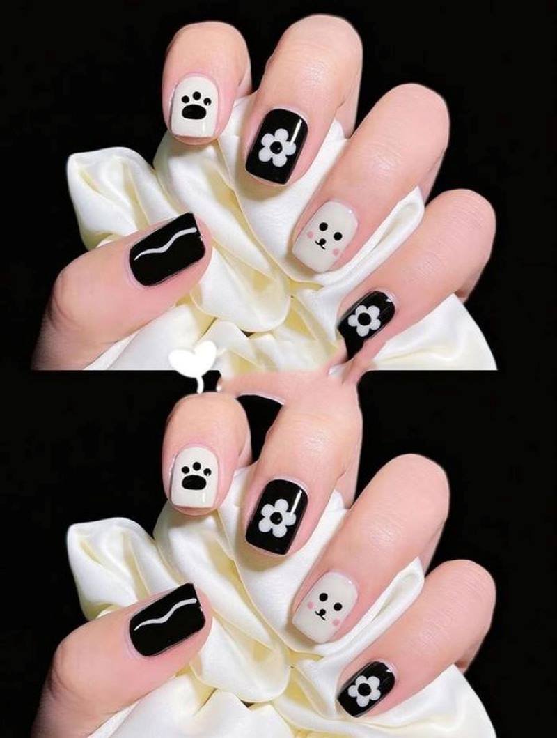 Mẫu nail đen trắng hoạ tiết hoa đáng yêu nhất định phải thử